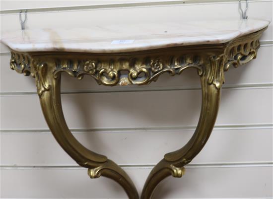 An Italian giltwood console table W.63cm